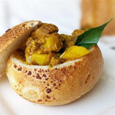  Bunny Chow! A South African Fusion Dish Bursting with Spicy Flavors and Creamy Textures